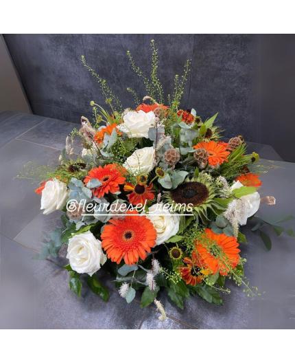 Coussin rond orangé