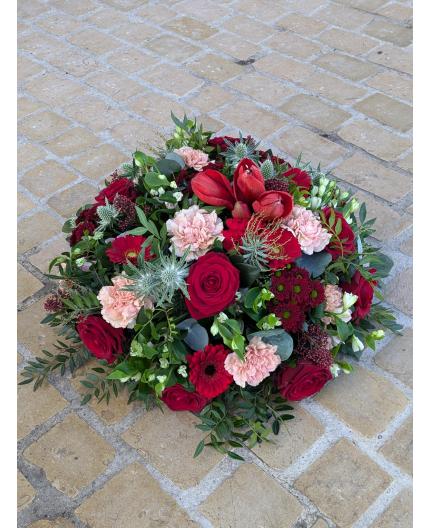 Coussin rond tons rouge 