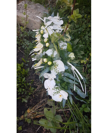 Raquette de fleurs dernier hommage